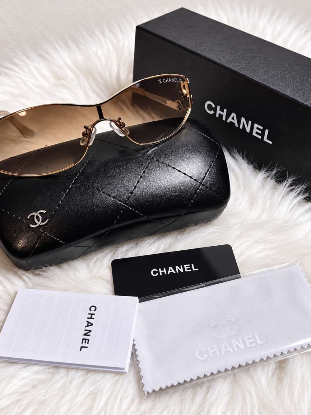 CHANEL Brown Gradient Rimless Women's Sunglasses with Gold Accents